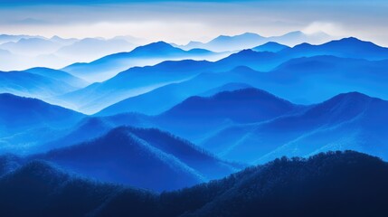 Poster - Serene blue mountain range under soft light in a tranquil landscape showcasing misty peaks and valleys ideal for nature photography.