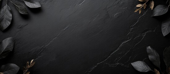 Poster - Elegant black slate background with greenery accents and ample empty space for text or branding applications