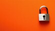 © Boonnam Burart - Modern steel padlock on a bright orange background, sharp and dynamic composition.