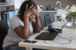 © Anna Berkut/Stocksy - problem with computer and work, stress, woman working form home