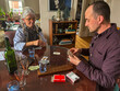 © tessy morelli/Stocksy - UGC Mother and Son playing card at home