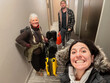 © tessy morelli/Stocksy - UGC POV family travel moment in the corridor