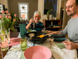 © tessy morelli/Stocksy - UGC POV family moment lunch at home