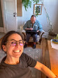 © tessy morelli/Stocksy - UGC POV happy couple working from home