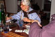 © tessy morelli/Stocksy - Flash candid moment playing cards