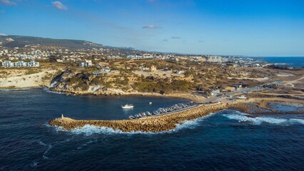 Canvas Print - Aerial view of a coastal town with harbor.