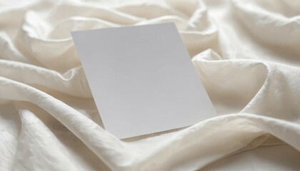 Wall Mural - Plain white card laid over softly wrinkled voile fabric with light blur