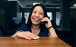 © VICTOR TORRES/Stocksy - Receptionist Smiling Cheerfully at Dental Clinic Front Desk