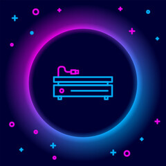 Poster - glowing neon line video game console icon isolated on black background. colorful outline concept. ve