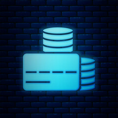 Poster - Glowing neon Credit card icon isolated on brick wall background. Online payment. Cash withdrawal. Financial operations. Shopping sign. Vector