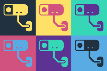 Poster - Pop art Security camera icon isolated on color background. Vector