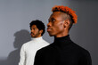 © valbar STUDIO/Stocksy - Two models  with contrasting hairstyles