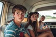 © Ева Поликарпова - Young adults sitting in the rear of a vehicle, possibly on a road trip or adventure