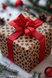 © Ева Поликарпова - A beautifully presented gift wrapped in brown paper and tied with a red ribbon