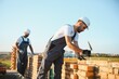 © Serhii - Group of workers at a construction site