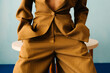 © Ulas&Merve/Stocksy - Minimalistic Fashion Style Featuring Brown Suit Jacket