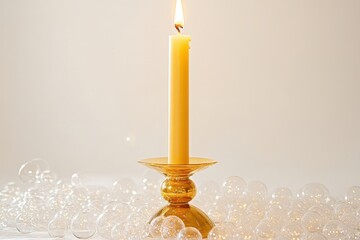 bubble candles alongside a large golden candleholder in the background