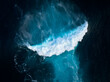 © C6 Studio/Stocksy - Top down aerial view of moody blue ocean wave