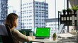 © DC Studio - Woman chief executive officer working with mockup copy space screen on device, developing a project for enterprise growth and objectives achievement. Female director with determination. Camera B.