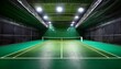 © Laurent - indoor tennis court with green surface and bright led lighting