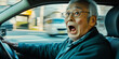 © cassis - 運転席で驚いた表情のシニア男性