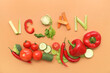 © Pixel-Shot - Composition with word VEGAN and different fresh vegetables on color background