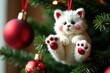 © Withun - White and red striped paws hanging on Christmas tree, holiday, festive