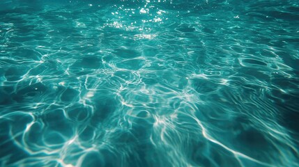 Poster - Rain droplets creating ripples in the surface of clear blue water, with a peaceful and calming atmosphere, ideal for nature photography