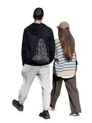 back view of a young couple walking together outdoors. man wears a black hoodie, gray sweatpants, dr