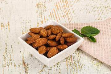 Wall Mural - Tasty ripe almond nuts heap