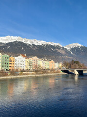 Wall Mural - Innsbruck in Austria Tyrol with traditional buildings and Alpine peaks panoramic view karwendel vertical