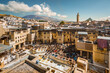 © Matteo Colombo - Old traditional tannery and city, high angle view, Fes, Morocco