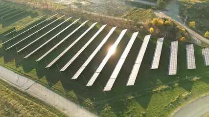 Wall Mural - Solar panels with sun glare reflection