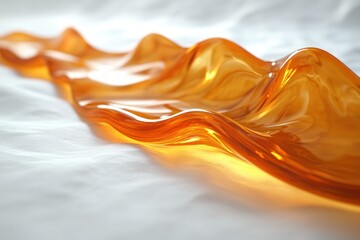 Poster - Translucent orange wave-like structure lying on a white surface, capturing light naturally. Generative AI
