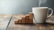 © KYR - A coffee cup beside a bar chart made of wooden blocks, symbolizing the growth and progress of a business in a sleek, modern workspace environment.