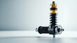 © Kullanat - Shock Absorber Component on Gray Background