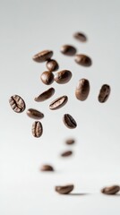Poster - Roasted coffee beans levitating against a clean white background, creating a dynamic and energetic scene ideal for coffee related projects and designs