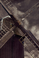 Wooden mill in stormy sky watercolor photo