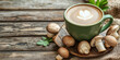 © Oleksandr - A steaming cup of mushroom coffee in a green mug, surrounded by fresh mushrooms and coffee beans on a rustic wooden table, creating a cozy, natural aesthetic.