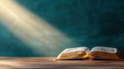 Poster - A Bible open on a wooden table, with a beam of light shining on its pages