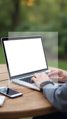 Poster - Freelancer working on laptop with blank screen outdoors in a park