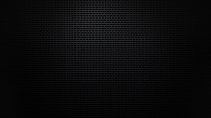 Black foil background with highlights and uneven texture, Industrial background. Black metal surface with regular round holes as texture