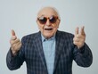 © DZMITRY - An older gentleman with silver hair, sporting sunglasses, and pulling silly expressions