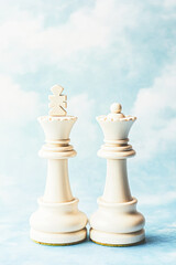 Wall Mural - Two white chess pieces, one of which is a king