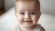 © Сергей Захаров - detailed view of baby face focusing on their smile with softly blurred background