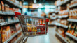 © Pavithiran - A shopping cart is blurred in an aisle