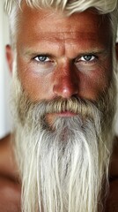 Wall Mural - A man with a long white beard and blue eyes