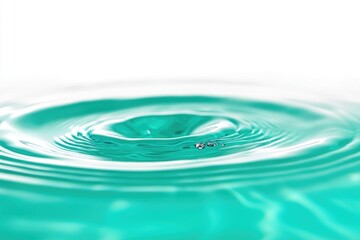 Poster - A detailed shot of a single water droplet floating on the surface of a pool
