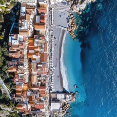 Poster - Aerial view of a small coastal town with buildings and boats