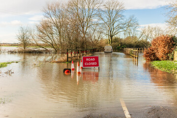 severe flooding on the b1223 road between the villages of ryther and cawood in north yorkshire with 